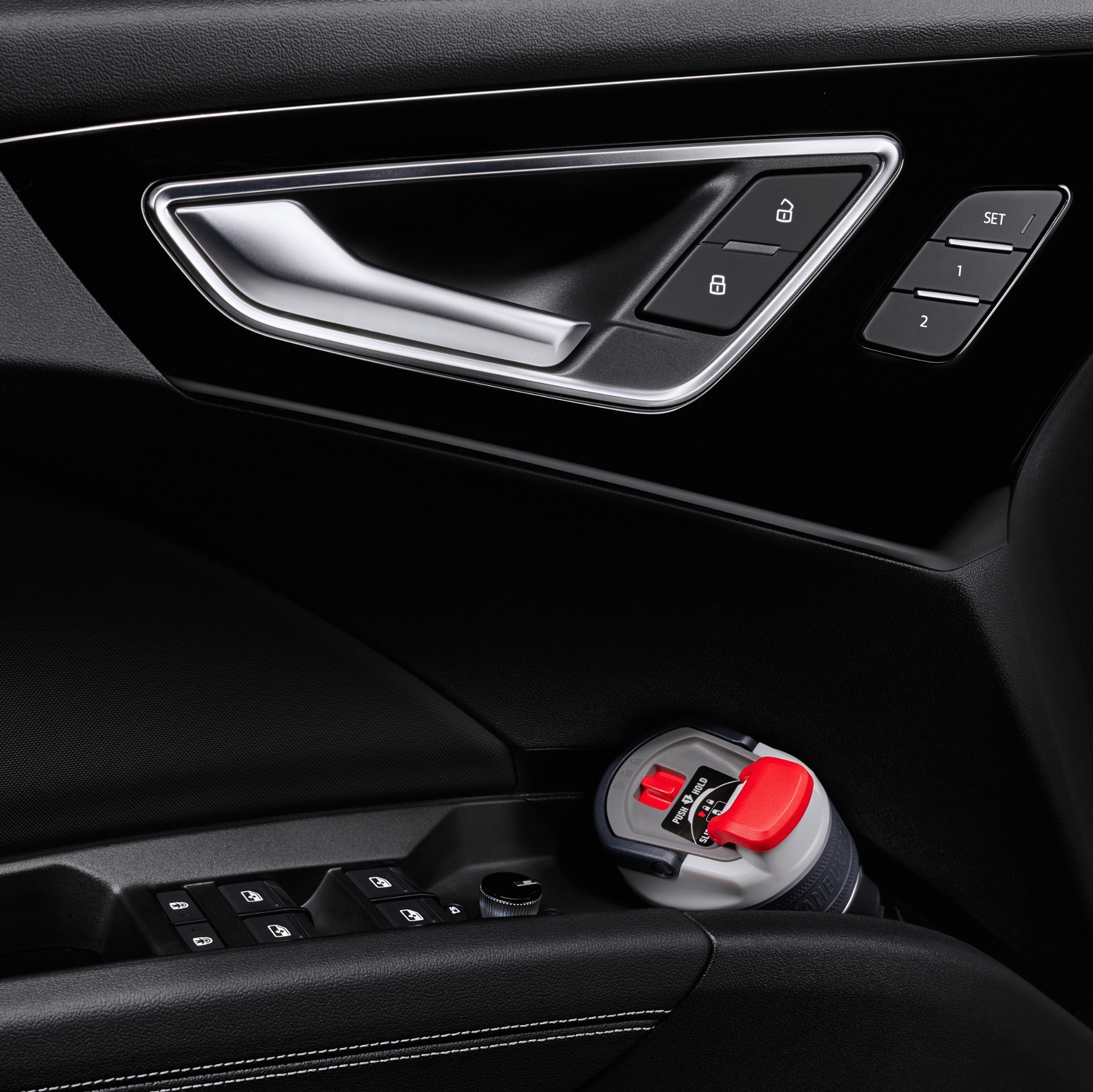 Close up of a bottle holder on the door of the Audi Q4 Sportback e-tron.