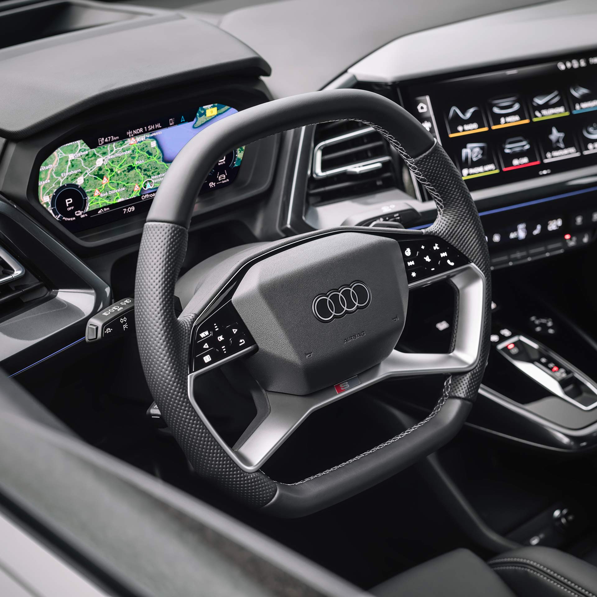 Close up of the steering wheel and virtual cockpit of the Audi Q4 Sportback e-tron.